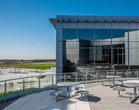 CityView Carousel Tables and Aluminum Panel Umbrellas